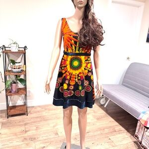 Vibrant Orange and Black Sunburst Dress